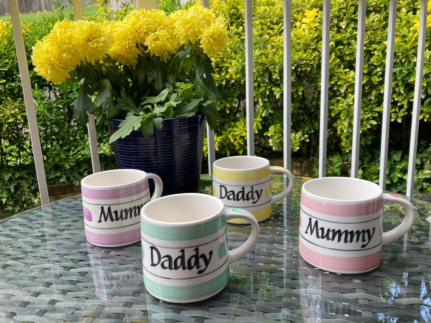 Yellow hand painted striped mug