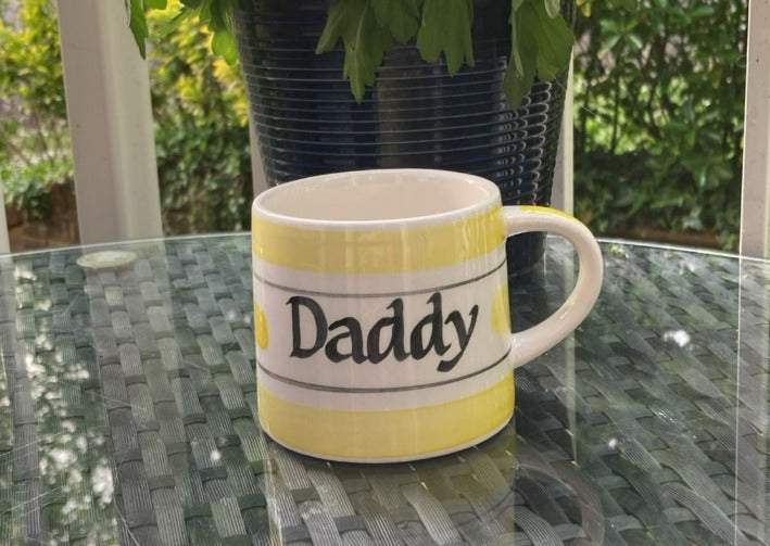 Yellow hand painted striped mug